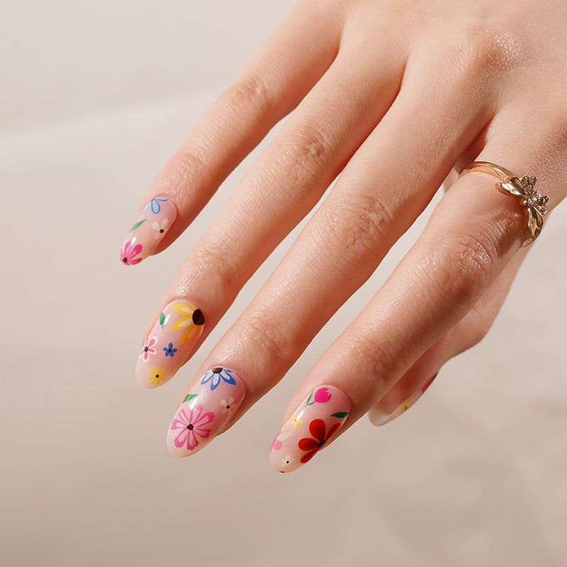 Stickers ongles en gel fleuris multicolores sur fond transparent rosé