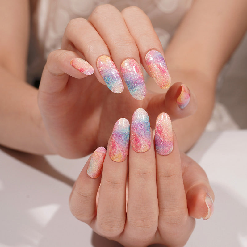 Stickers ongles gel effet sable pailleté multicolore aux teintes pastel fondues façon tornade artistique